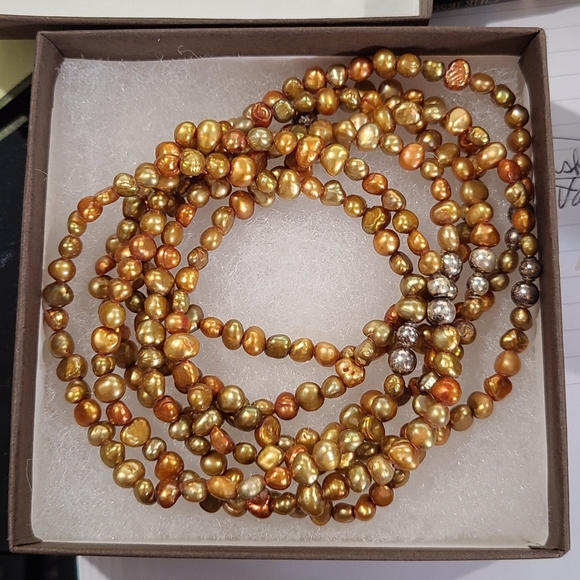 Set of 7 stretch bracelets by Silpada.